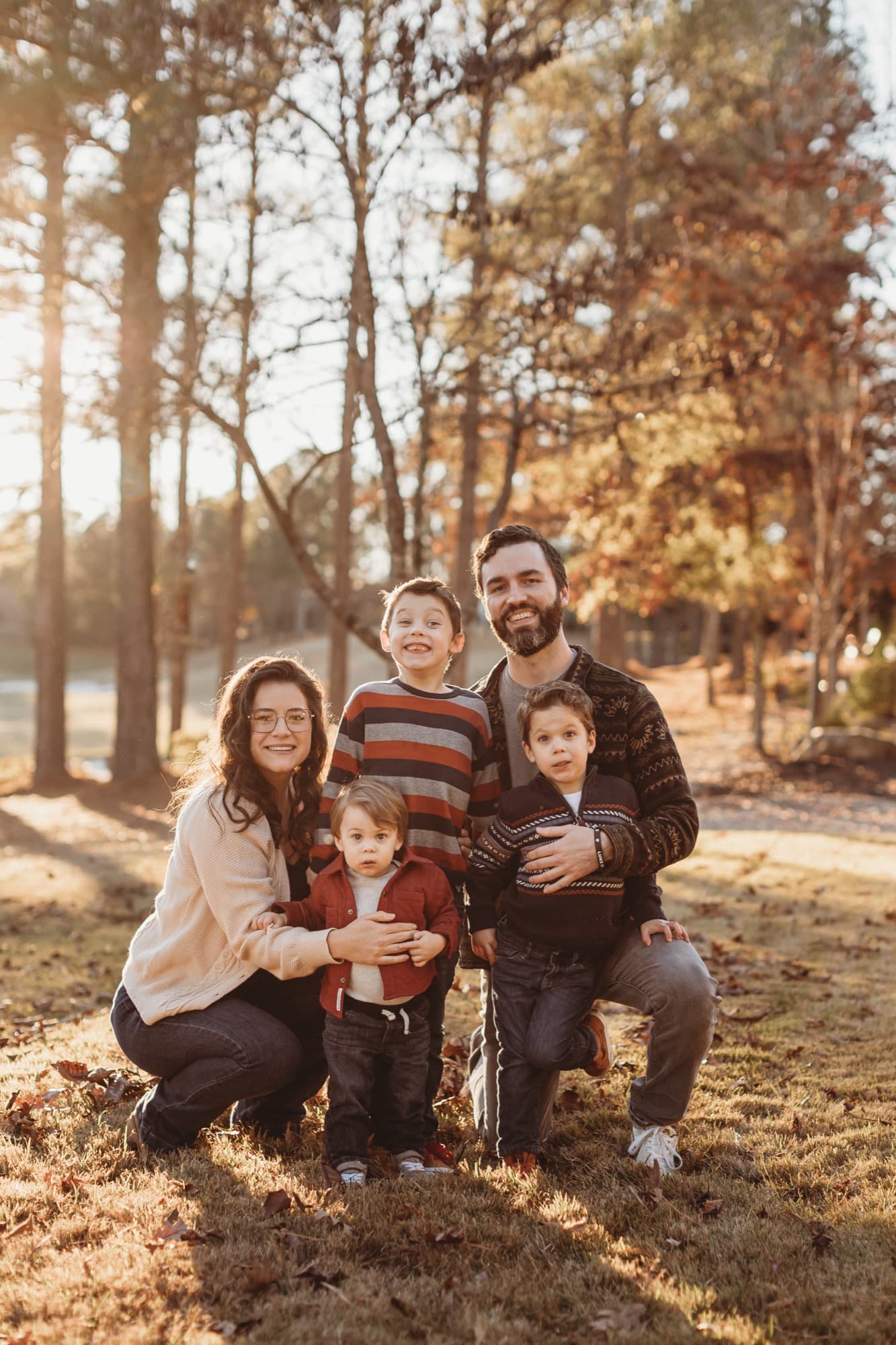 Ryan Williams with his wife and three kids outdoors on an autumn afternoon